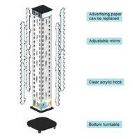 Présentoir rotatif pour lunettes de soleil avec miroir supérieur et tiroir inférieur. Support à lunettes avec porte-étiquettes et panneau publicitaire pour la vente au détail.