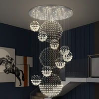 Lustre contemporain OEM à longs pendentifs en cristal pour hall d'entrée, salon, duplex, loft et escalier