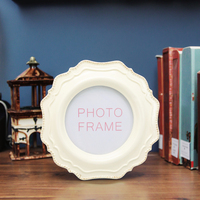 Cadre photo européen antique rond en résine artisanat luxueux classique pour la décoration intérieure couleur blanche