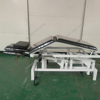 Table de massage élévatrice électrique de bonne qualité Table de physiothérapie portable à vendre