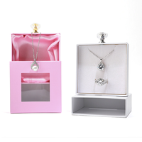 Tiroir en papier Boîtes d'emballage pour bijoux avec poignée en cristal Boîte à bijoux pour collier Tiroir cadeau Carton imprimé rose
