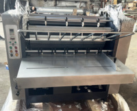Les fabricants de machines vendent une machine à plastifier papier semi-automatique à grande vitesse et de haute qualité