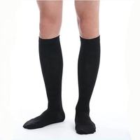Repose-pieds de voyage Travel Comforts, chaussettes de sport de course Travelsky, chaussettes de football personnalisées, chaussettes de compression hautes pour hommes