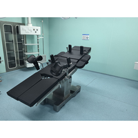 Table d'opération chirurgicale électrique six fonctions compatible radiographie avec système de contrôle double et fonction de translation longitudinale