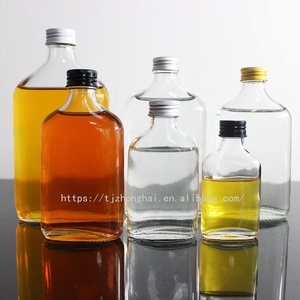 Fabricante personalizado de café frío botella de vidrio 50ml 200ml 250ml 350ml para bebidas té licor whisky Vodka <span class=keywords><strong>Tequlia</strong></span> con tapa - Product Image 6