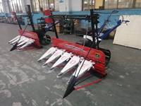Moissonneuse-batteuse multifonctionnelle avec entraînement par courroie avant du tracteur pour la récolte du riz et du maïs.