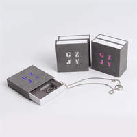 Nouvelle conception, vente chaude : Boîte à bijoux magnétique dorée Misteriosas, emballage pour montres de table, boîte en papier pour lunettes, emballage de bijoux