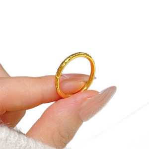 This popular Little Red Book (Xiaohongshu) item is a solid gold-plated, round, <b>plain</b> band <b>ring</b> with a closed design. It's - Product Image 5