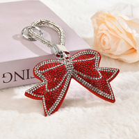 Nouveaux porte-clés en cristal scintillant avec nœud, porte-clés à pompon, accessoires pour sac, pendentif de voiture, porte-clés en forme de nœud, breloques pour sac à main