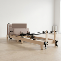 Lit de Pilates pliable en bois d'acajou et d'érable sur mesure OEM pour studio professionnel et salle de sport – Machine de Pilates Reformer
