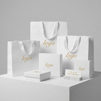 Conception de logo personnalisé guichet unique fabricant de produit ensemble d'emballage boîte de papier sac de papier pour bijoux cadeau bougie