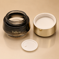 Ensemble de flacons et pots cosmétiques en verre noir dégradé de luxe avec bouchon doré brillant pour sérum et crème de soin