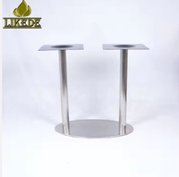 Base de table de bistrot moderne à double colonne en acier inoxydable poli, ovale, avec plateau supérieur noir
