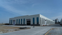 Entrepôt préfabriqué en structure légère en acier sur mesure en Chine avec services de soudage de la part d'une usine de structures en acier