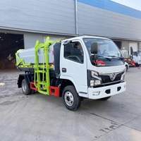 Camion à ordures compacteur Dongfeng 4x2 diesel à boîte de vitesses manuelle et chargement latéral, véhicule professionnel de transfert de déchets pour hôtels