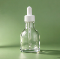 Flacon compte-gouttes en verre transparent, flacon pour essence liquide, flacon d'huile essentielle de 50 ml, flacon d'emballage pour produits de soin de la peau
