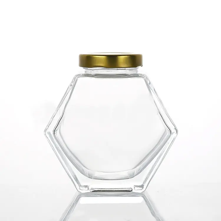 الجملة مسدس الزجاج العسل الحاويات العسل زجاجة تخزين دورق عسل زجاجي مع غطاء معدني