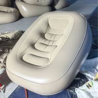 Fauteuil gonflable ergonomique avec surface floquée grise, intérieur gris, soutien doux, canapé gonflable individuel