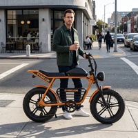 Vélo électrique rétro élégant à gros pneus avec panier de rangement inférieur, vélo électrique de banlieue orange pour les trajets quotidiens en ville