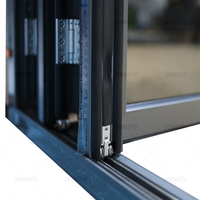 Dongyu Patio extérieur arrière-cour Porte pliante en accordéon à double vitrage Isolation thermique Porte pliante en aluminium