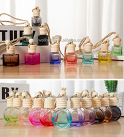 Bouteille en verre de parfum de parfum de sens de sortie de ventilateur automobile de 10ml avec le chapeau en bois et la bouteille de diffuseur de voiture d'agrafe d'évent en métal