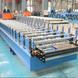 Machine automatique <span class=keywords><strong>de</strong></span> formage <span class=keywords><strong>de</strong></span> rouleaux en <span class=keywords><strong>acier</strong></span> GI PPGI pour la fabrication <span class=keywords><strong>de</strong></span> panneaux muraux <span class=keywords><strong>de</strong></span> <span class=keywords><strong>toiture</strong></span> trapézoïdaux - Product Image 3