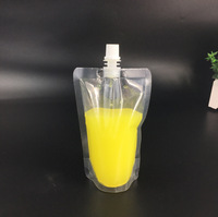 Emballage de jus de boisson PET/PE biodégradable jetable personnalisé étanche à l'humidité sécurisé sac de boisson à bec debout gravure de poche