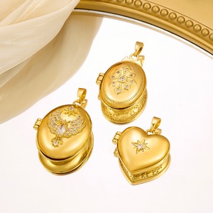 Colgante de medallón de aleación de cobre con forma de corazón ovalado dorado de moda, con cristal, para accesorios de joyería DIY - Product Image 1