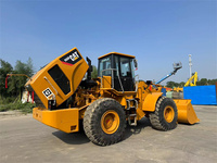 Chargeuse sur pneus Caterpillar CAT 966H d'occasion, modèle 2022, transmission 4x4, chargeuse frontale avec moteur et roulement, capacité de charge nominale de 6 tonnes