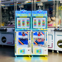 Accepteur de pièces commercial pour distributeur automatique de jeux à clip pour enfants, jeu de récompense en métal pour parc d'attractions, haute rentabilité, prise en charge de l'anglais, OEM ODM