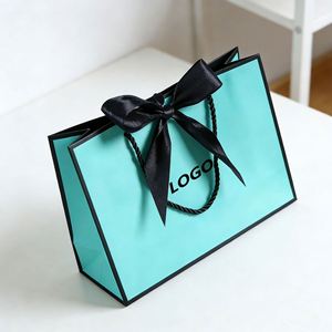Factory Direct Customizable Turquoise Paper <b>Gift</b> <b>Bag</b> With Black Bow & Handle Elegant Ideal for Clothing & Jewelry Packaging - Product Image 1