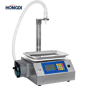 Machine de remplissage de miel semi-automatique de haute précision avec PLC, pour petits pots et bouteilles, à piston de table, qualité alimentaire - Product Image 1