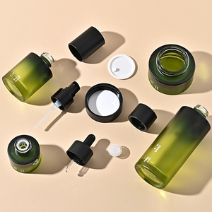 Vòng xi lanh thủy tinh mỹ phẩm bao bì container 30ml <span class=keywords><strong>50ml</strong></span> 100ml Huyết thanh chai lotion tùy chỉnh Gradient màu xanh lá cây bơm chai - Product Image 1