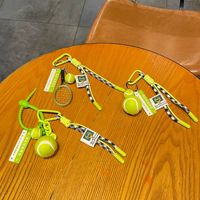 Sport-Schlüsselanhänger Grüner Tennisschläger Ball Quaste Schlüsselanhänger Auto-Schlüsselringe Zubehör Geflochtenes Seil Taschenanhänger Schlüsselband Deko Geschenk