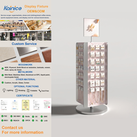 Expositor de metal independiente Kainice con ganchos extraíbles y rotación de 360° para pendientes, collares y joyería en tiendas y boutiques.