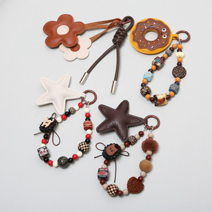 Correa para teléfono con cuentas estilo vintage americano, colgante de cuero con flor y estrella para bolso, llavero de donut, bonito colgante de cámara CCD para mujer - Product Image 4