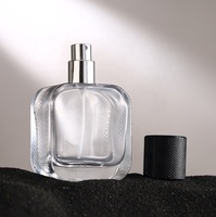 Bouteille de parfum en verre transparent haut de gamme 100ml 50ml 30ml avec couvercle de pulvérisateur à pompe Wx-37 bouteille vide de vaporisateur de sous-emballage