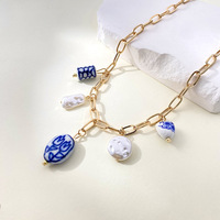 Collier en chaîne avec pendentif en forme de cœur en imitation perle céramique, design unique, accessoire de style luxe léger