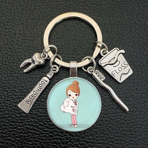 Porte-clés en forme de dent mignon et beau cadeau populaire dans la clinique d'orthodontie dentaire <span class=keywords><strong>tout</strong></span> <span class=keywords><strong>le</strong></span> <span class=keywords><strong>monde</strong></span> aime - Product Image 1