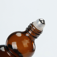 Vente en gros de bouteilles à bille roulante en verre dépoli de 30 ml 50 ml 100 ml pour huile essentielle