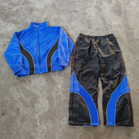 Ensembles de survêtements YSJY en gros à marque privée avec bandes réfléchissantes, logo personnalisé, vêtements de sport d'entraînement, coupe-vent en nylon pour hommes