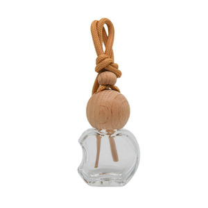 Diffuseur d'air frais pour voiture en verre transparent suspendu avec bouchon en bois naturel - Product Image 1