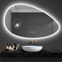 Écran tactile anti-buée imperméable de style moderne irrégulier avec miroir mural intelligent LED