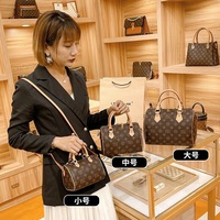 Sac Boston de luxe pour femme en cuir véritable, bandoulière, nouvelle collection printemps-été, avec fermeture éclair et lettres, par un créateur de marque