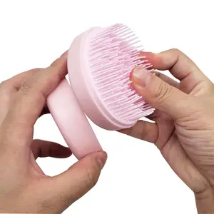 Mini brosse à cheveux en forme d'œuf ronde brosse à cheveux douce démêlante brosse à cheveux peigne de coiffure pour voyage