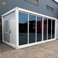 Maison conteneur moderne préfabriquée à mur-rideau en verre, unité de logement modulaire en acier pour usage commercial et bureaux