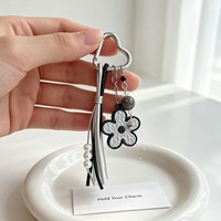Lot de porte-clés en similicuir à fleur, avec sangle en cuir, pompon, breloque de sac et pendentif perle, accessoires Kawaii