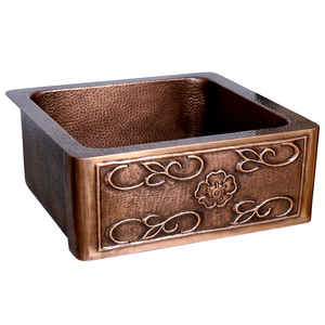 Detalle en primer plano de un lavabo frontal de cobre adornado con un diseño de flor esculpida y un relieve de enredadera. - Product Image 1