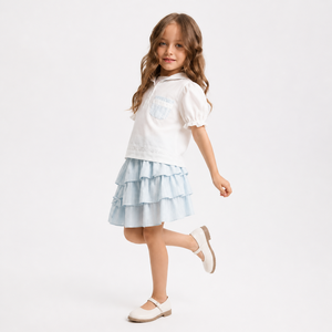 Nuovo Arrivo Estate 2026: Set Stile Coreano con Camicia in Cotone <span class=keywords><strong>a</strong></span> Maniche Corte e Gonna <span class=keywords><strong>a</strong></span> Strati per Bambine - Product Image 1