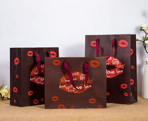 ถุงกระดาษสีขาวพิมพ์ลายตามสั่ง หรูหรา ทนทาน เป็นมิตรกับสิ่งแวดล้อม พับเก็บได้ ใช้ซ้ำได้ พร้อมหูหิ้วริบบิ้น - Product Image 4